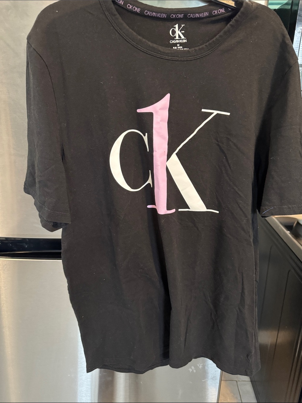 Calvin Klein Kids Black Tee with Pink & White CK Graphic